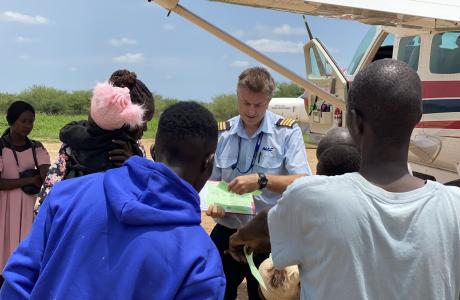 Refugees boarding the flight in Renk, South Sudan